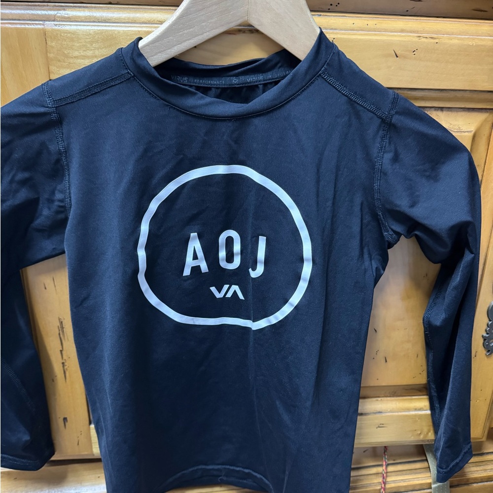 AOJ RVCA kids Sz L Rash Guard. Used under Gi. RVCA VIRUS sports technology
